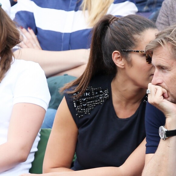 Elisa Tovati et son mari Sébastien Saussez- People dans les tribunes des Internationaux de France de tennis de Roland Garros à Paris. Le 25 mai 2016.