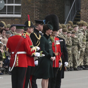 Le prince William et la duchesse Catherine de Cambridge assistaient à la parade de la Saint-Patrick avec le régiment des Irish Guards aux Cavalry Barracks du régiment des Irish Guards à Hounslow, dans l'ouest de Londres, le 17 mars 2017.