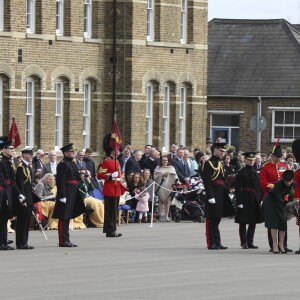 Le prince William et la duchesse Catherine de Cambridge assistaient à la parade de la Saint-Patrick aux Cavalry Barracks du régiment des Irish Guards à Hounslow, dans l'ouest de Londres, le 17 mars 2017.