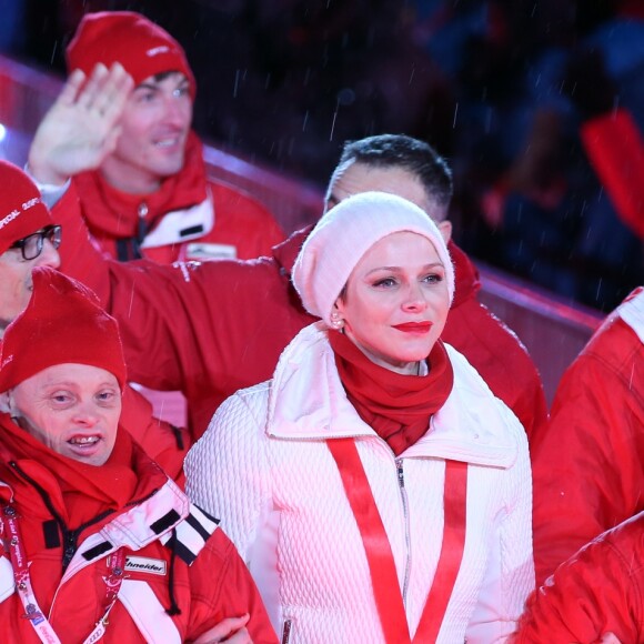 La princesse Charlene de Monaco défile avec la délégation monégasque lors de la cérémonie d'ouverture des Jeux olympiques spéciaux d'hiver à Schladming en Autriche, le 18 mars 2017.