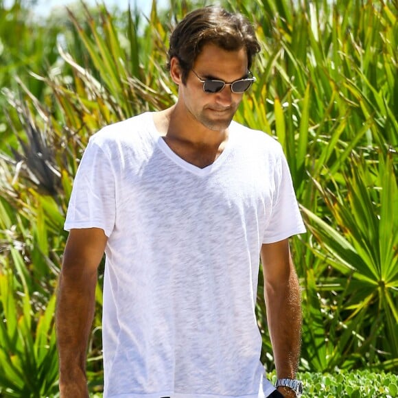 Roger Federer et sa femme Miroslava Vavrinec (Mirka) profitent d'une belle journée ensoleillée sur une plage à Miami, le 29 mars 2017.