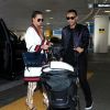 John Legend arrive à l'aéroport de LAX avec sa femme Chrissy Teigen et leur fille Luna. Los Angeles, le 16 mars 2017.
