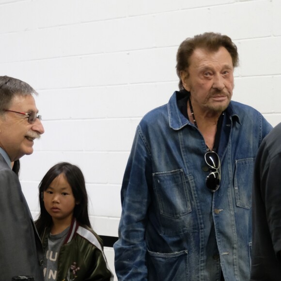 Exclusif - Johnny Hallyday, sa femme Laeticia et leur fille Joy au bureau de vote de Los Angeles pour les élections présidentielles françaises de 2017. Le 6 mai 2017 © Chris Delmas / Bestimage