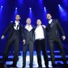 Keith Duffy, Ronan Keating, Mikey Graham, Shane Lynch - Le groupe Boyzone en concert au Wembley Arena a Londres, le 21 decembre 2013.