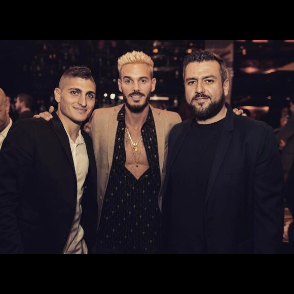 M. Pokora fête son disque de diamant (500.000 albums) au restaurant la "Gioia" à Paris, le 10 mai 2017, avec le joueur du PSG Marco Verratti.