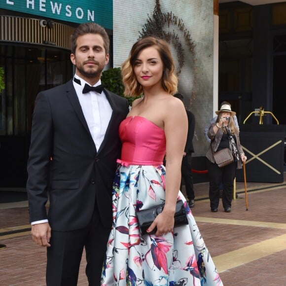 Priscilla Betti (Robe Christophe Guillarmé en faille de soie imprimée, bijoux Elsa Lee Paris et pochette Carmen Steffens) et son compagnon Gilles Noto à la sortie de l'hôtel Majestic pendant le 70 ème Festival International du film de Cannes, France, le 18 mai 2017. © Giancarlo Gorassini/Bestimage
