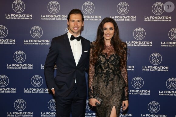 Exclusif - Grzegorz Krychowiak et sa compagne Célia Jaunat - Dîner de gala au profit de la Fondation PSG au Parc des Princes à Paris le 16 mai 2017.