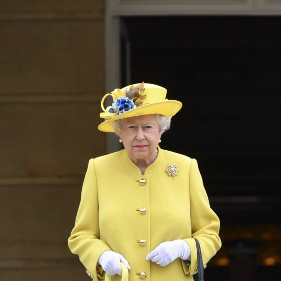 La reine Elizabeth II et le prince Philip ont observé une minute de silence suite à l'attentat de Manchester lors de la garden party donnée dans les jardins de Buckingham Palace à Londres, le 23 mai 2017.