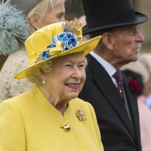 La reine Elizabeth II et le prince Philip ont observé une minute de silence suite à l'attentat de Manchester lors de la garden party donnée dans les jardins de Buckingham Palace à Londres, le 23 mai 2017.