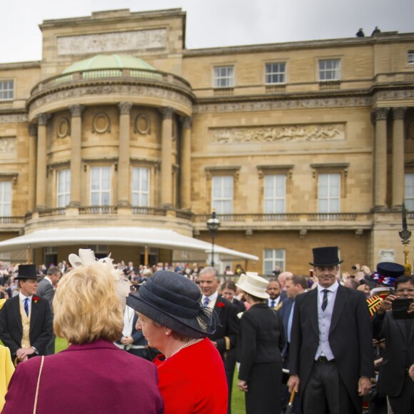 La reine Elizabeth II et le prince Philip ont observé une minute de silence suite à l'attentat de Manchester lors de la garden party donnée dans les jardins de Buckingham Palace à Londres, le 23 mai 2017.