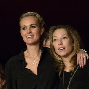 Laeticia Hallyday et Laura Smet - Aftershow apres le concert caritatif de Johnny Hallyday pour l'association de sa femme "La Bonne Etoile", qui vient en aide aux enfants du Vietnam, au Trianon a Paris, le 15 decembre 2013.