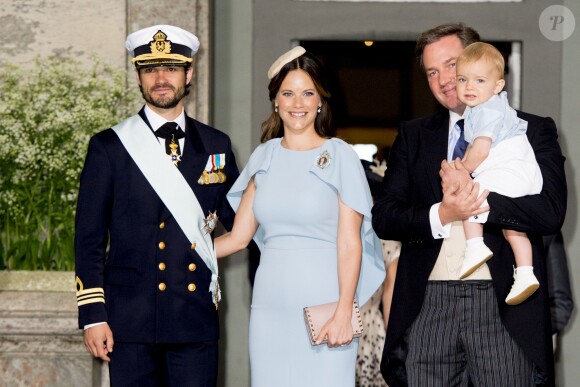 Le prince Carl Philip et la princesse Sofia (Hellqvist), Chris O'Neill et son fils le prince Nicolas - Baptême du prince Oscar de Suède à Stockholm en Suède le 27 mai 2016.