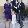 La princesse Victoria (enceinte), le prince Daniel de Suède et leur fille la princesse Estelle de Suède - Baptême du prince Nicolas de Suède à la chapelle du palais Drottningholm à Stockholm, le 11 octobre 2015
