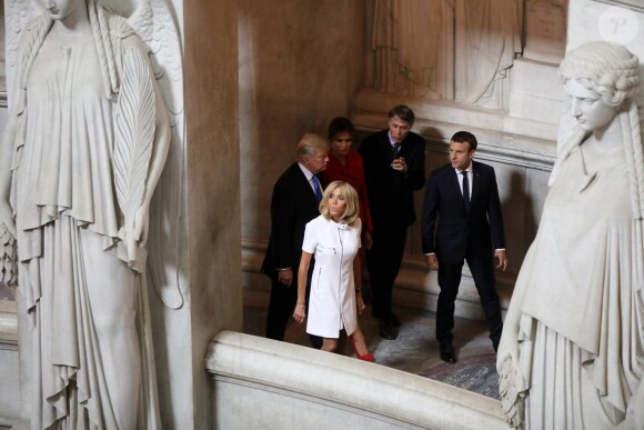 Le président de la République Emmanuel Macron, sa femme Brigitte Macron (Trogneux), le président des Etats-Unis Donald Trump et sa femme Melania Trump lors de la cérémonie d'accueil du président des Etats-Unis à l'Hôtel National des Invalides à Paris le 13 juillet 2017. © Dominique Jacovides/Bestimage