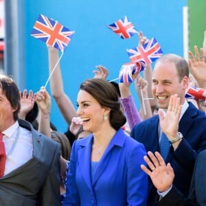 Le prince William et la duchesse Catherine de Cambridge en visite à l'association Strassenkinder à Berlin, le 19 juillet 2017.