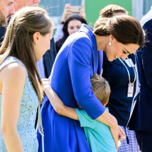 Le prince William et la duchesse Catherine de Cambridge en visite à l'association Strassenkinder à Berlin, le 19 juillet 2017.