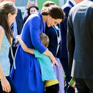 Le prince William et la duchesse Catherine de Cambridge en visite à l'association Strassenkinder à Berlin, le 19 juillet 2017.