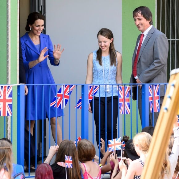 Le prince William et la duchesse Catherine de Cambridge en visite à l'association Strassenkinder à Berlin, le 19 juillet 2017.