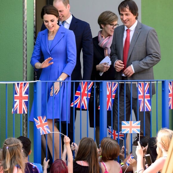 Le prince William et la duchesse Catherine de Cambridge en visite à l'association Strassenkinder à Berlin, le 19 juillet 2017.
