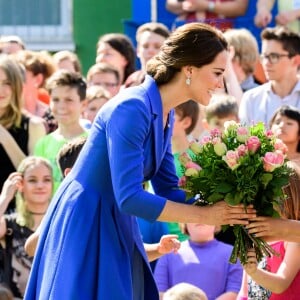 Le prince William et la duchesse Catherine de Cambridge en visite à l'association Strassenkinder à Berlin, le 19 juillet 2017.