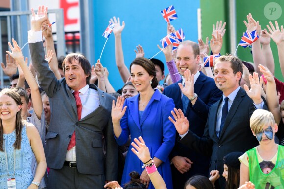 Le prince William et la duchesse Catherine de Cambridge en visite à l'association Strassenkinder à Berlin, le 19 juillet 2017.
