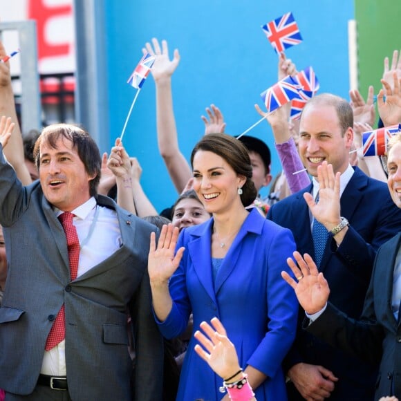 Le prince William et la duchesse Catherine de Cambridge en visite à l'association Strassenkinder à Berlin, le 19 juillet 2017.