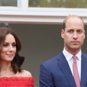 Le prince William et la duchesse Catherine de Cambridge lors de la garden party organisée par l'ambassadeur de Grande-Bretagne à Berlin, Sebastian Wood, le 19 juillet 2017 en l'honneur de l'anniversaire de la reine.