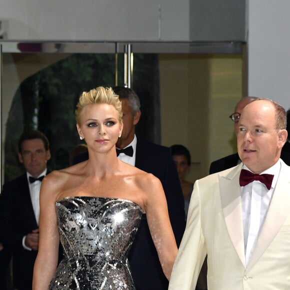 La princesse Charlene et le prince Albert II de Monaco lors du 69e Gala de la Croix-Rouge monégasque dans la Salle des Étoiles du Sporting à Monaco, le 28 juillet 2017. © Bruno Bebert/Bestimage