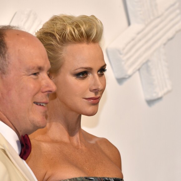 La princesse Charlene et le prince Albert II de Monaco lors du 69e Gala de la Croix-Rouge monégasque dans la Salle des Étoiles du Sporting à Monaco, le 28 juillet 2017. © Bruno Bebert/Bestimage