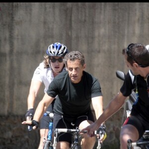 Nicolas Sarkozy et son fils Jean font du vélo autour du Cap Nègre en août 2010. Dominique Jacovides - Bestimage