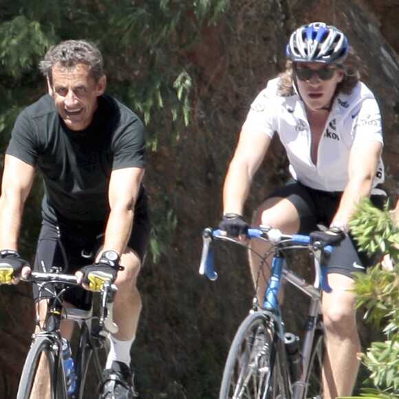 Nicolas Sarkozy et son fils Jean font du vélo autour du Cap Nègre en août 2010. Dominique Jacovides - Bestimage