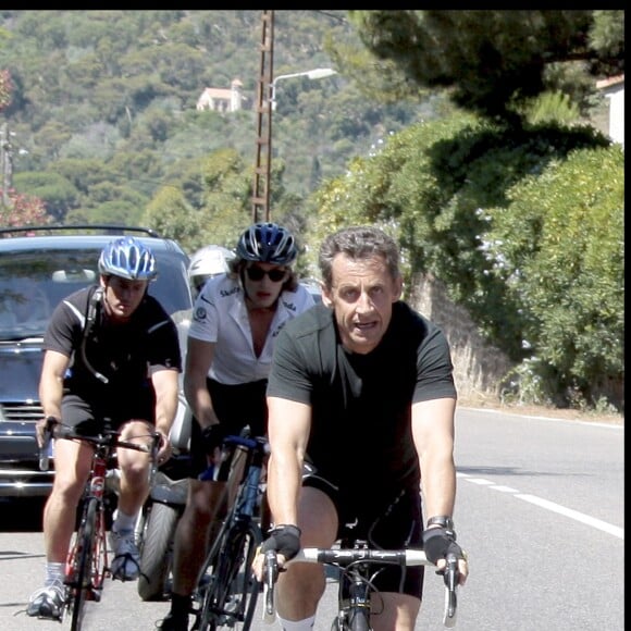 Nicolas Sarkozy et son fils Jean font du vélo autour du Cap Nègre en août 2010. Dominique Jacovides - Bestimage