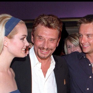 Laeticia Hallyday, Johnny Hallyday, David Hallyday et Estelle Lefébure aux 56 ans de Johnny à Paris en 1999