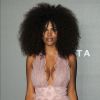 Tina Kunakey au photocall de l'amfAR 2017 à Milan, le 21 septembre 2017.