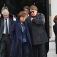 Jean-Louis Borloo, Bernard Tapie et sa femme Dominique Tapie - Sorties de obsèques de Jean-Noël Tassez, le compagnon de Charlotte Rampling, au crématorium du cimetière du Père-Lachaise à Paris, le 9 octobre 2015.