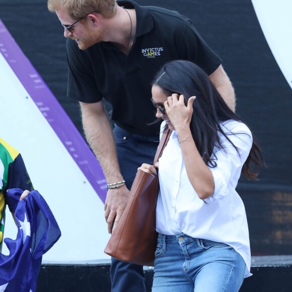 Première apparition officielle du prince Harry et sa compagne Meghan Markle dans les tribunes de la finale de tennis à la troisième édition des Invictus Games à Toronto, Ontario, Canada, le 25 septembre 2017. 