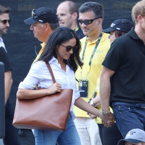 Première apparition officielle du prince Harry et sa compagne Meghan Markle dans les tribunes de la finale de tennis à la troisième édition des Invictus Games à Toronto, Ontario, Canada, le 25 septembre 2017. 