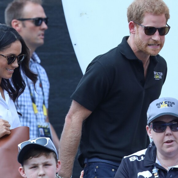Première apparition officielle du prince Harry et sa compagne Meghan Markle dans les tribunes de la finale de tennis à la troisième édition des Invictus Games à Toronto, Ontario, Canada, le 25 septembre 2017. 