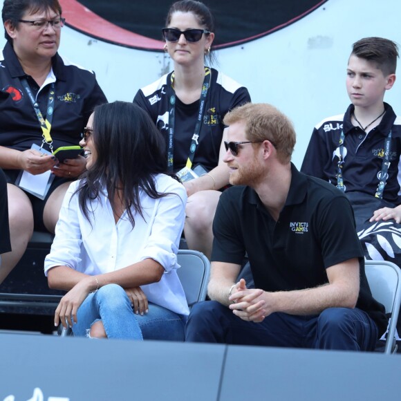 Première apparition officielle du prince Harry et sa compagne Meghan Markle dans les tribunes de la finale de tennis à la troisième édition des Invictus Games à Toronto, Ontario, Canada, le 25 septembre 2017. 