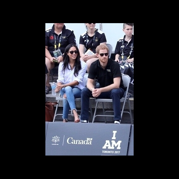 Première apparition officielle du prince Harry et sa compagne Meghan Markle dans les tribunes de la finale de tennis à la troisième édition des Invictus Games à Toronto, Ontario, Canada, le 25 septembre 2017. 