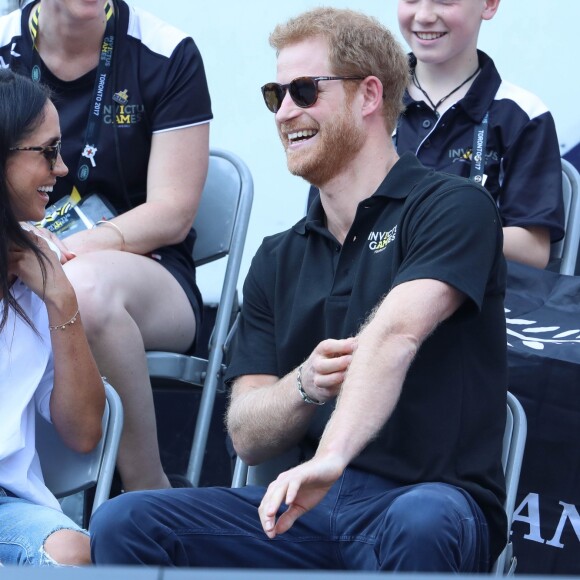 Première apparition officielle du prince Harry et sa compagne Meghan Markle dans les tribunes de la finale de tennis à la troisième édition des Invictus Games à Toronto, Ontario, Canada, le 25 septembre 2017. 