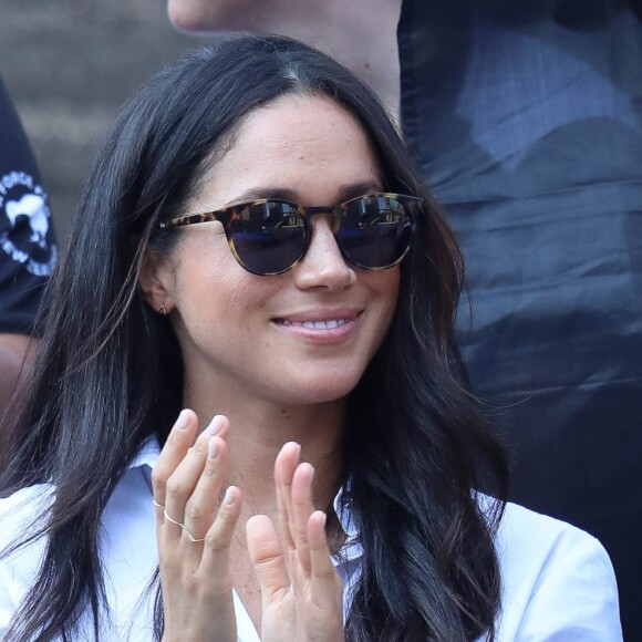 Première apparition officielle du prince Harry et sa compagne Meghan Markle dans les tribunes de la finale de tennis à la troisième édition des Invictus Games à Toronto, Ontario, Canada, le 25 septembre 2017. 