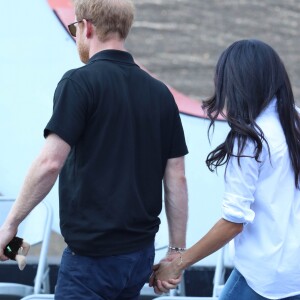 Première apparition officielle du prince Harry et sa compagne Meghan Markle dans les tribunes de la finale de tennis à la troisième édition des Invictus Games à Toronto, Ontario, Canada, le 25 septembre 2017. 