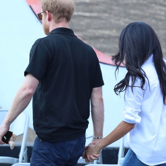 Première apparition officielle du prince Harry et sa compagne Meghan Markle dans les tribunes de la finale de tennis à la troisième édition des Invictus Games à Toronto, Ontario, Canada, le 25 septembre 2017. 