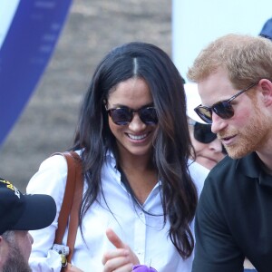 Première apparition officielle du prince Harry et sa compagne Meghan Markle dans les tribunes de la finale de tennis à la troisième édition des Invictus Games à Toronto, Ontario, Canada, le 25 septembre 2017. 