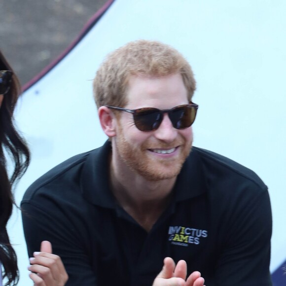 Première apparition officielle du prince Harry et sa compagne Meghan Markle dans les tribunes de la finale de tennis à la troisième édition des Invictus Games à Toronto, Ontario, Canada, le 25 septembre 2017. 