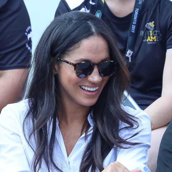 Première apparition officielle du prince Harry et sa compagne Meghan Markle dans les tribunes de la finale de tennis à la troisième édition des Invictus Games à Toronto, Ontario, Canada, le 25 septembre 2017. 