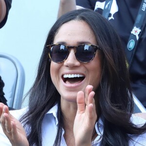 Première apparition officielle du prince Harry et sa compagne Meghan Markle dans les tribunes de la finale de tennis à la troisième édition des Invictus Games à Toronto, Ontario, Canada, le 25 septembre 2017. 