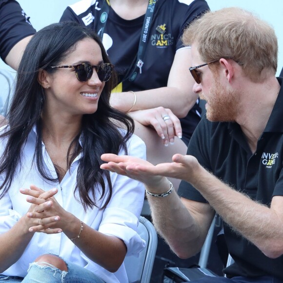Première apparition officielle du prince Harry et sa compagne Meghan Markle dans les tribunes de la finale de tennis à la troisième édition des Invictus Games à Toronto, Ontario, Canada, le 25 septembre 2017. 