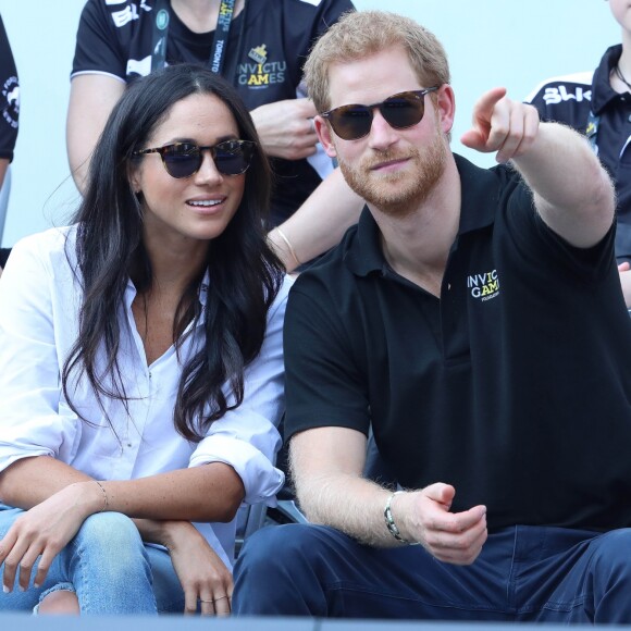 Première apparition officielle du prince Harry et sa compagne Meghan Markle dans les tribunes de la finale de tennis à la troisième édition des Invictus Games à Toronto, Ontario, Canada, le 25 septembre 2017. 